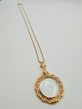 D’Orlan Chain Magnifying Glass Pendant Gold Tone Long Necklace